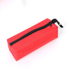 A red compact organizer bag made of Oxford cloth with a black zipper and strap.