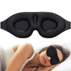 A black 3D contoured silk-touch sleep mask is shown being worn by a person lying down.