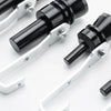 Silver metal exhaust turbine whistle components with black tips and mounting brackets