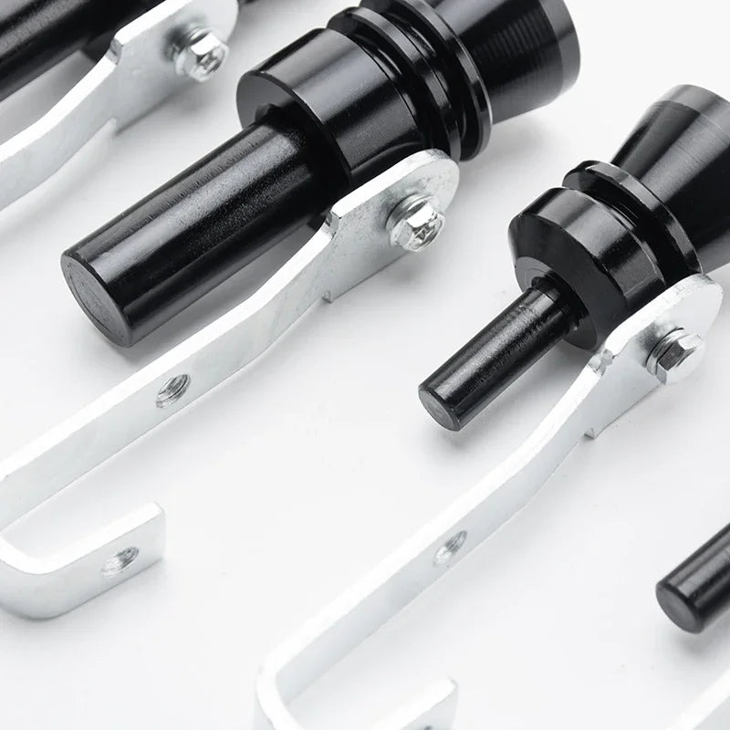 Silver metal exhaust turbine whistle components with black tips and mounting brackets