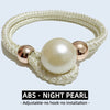 A set of two adjustable night pearl rope tie-back hair accessories