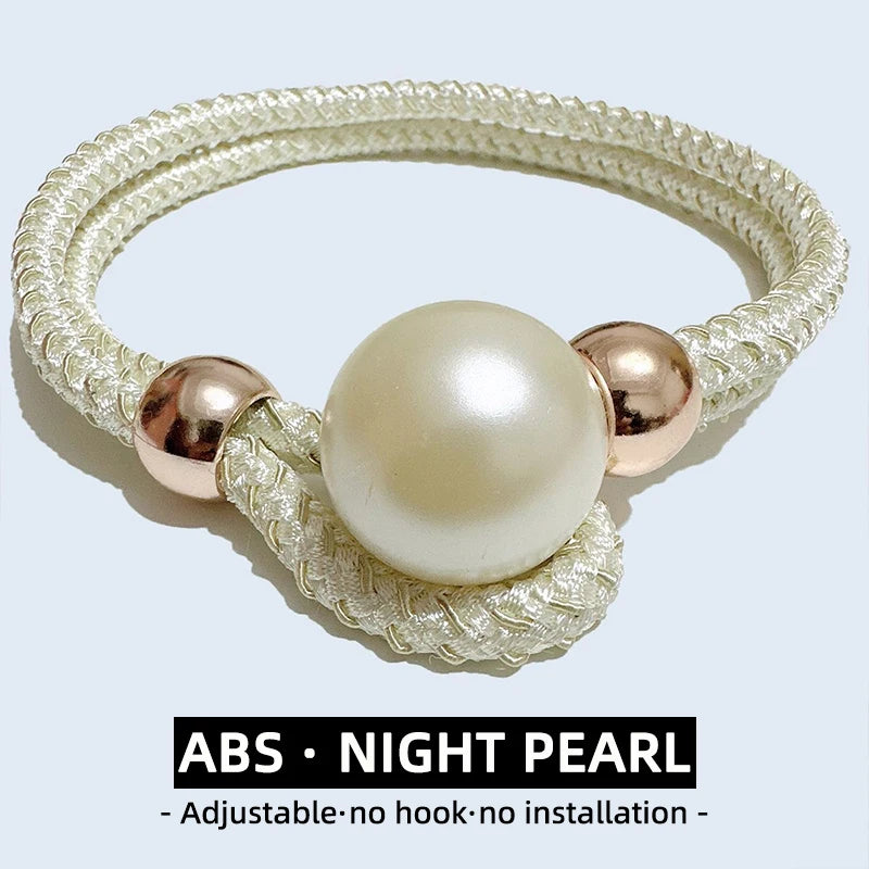 A set of two adjustable night pearl rope tie-back hair accessories