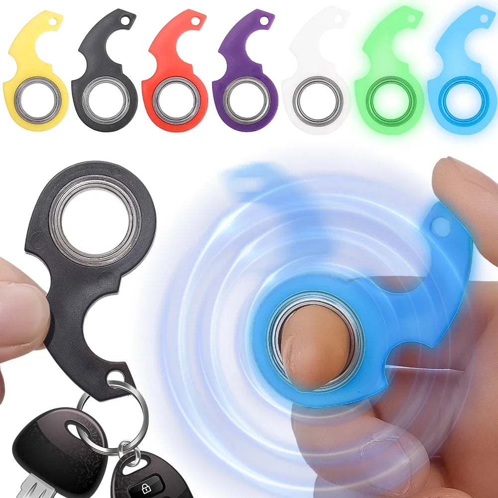 A collection of metal fidget spinners in various colors and a keychain version being spun by a hand.