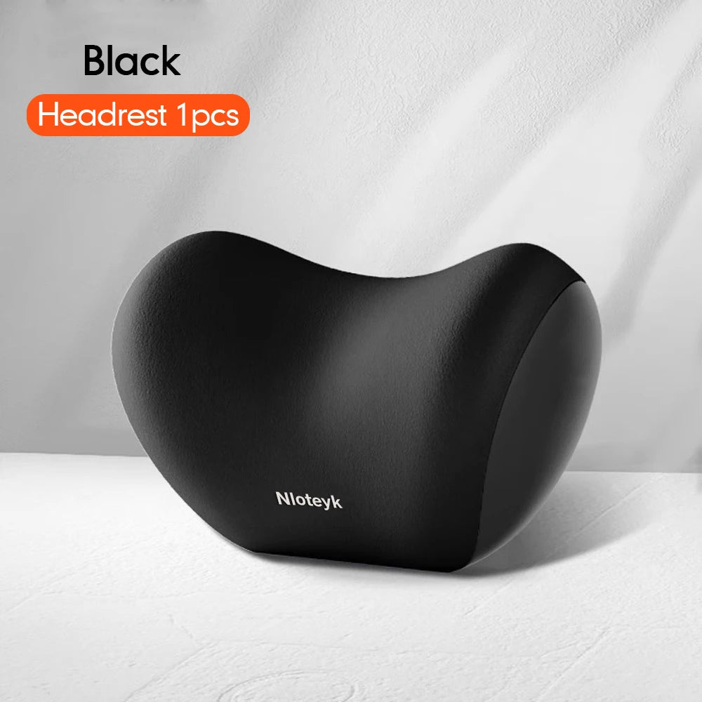 Black Memory Foam car headrest and lumbar support pillow shown on a white surface.