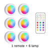 Six round RGB LED lamps and one remote control for under cabinet lighting