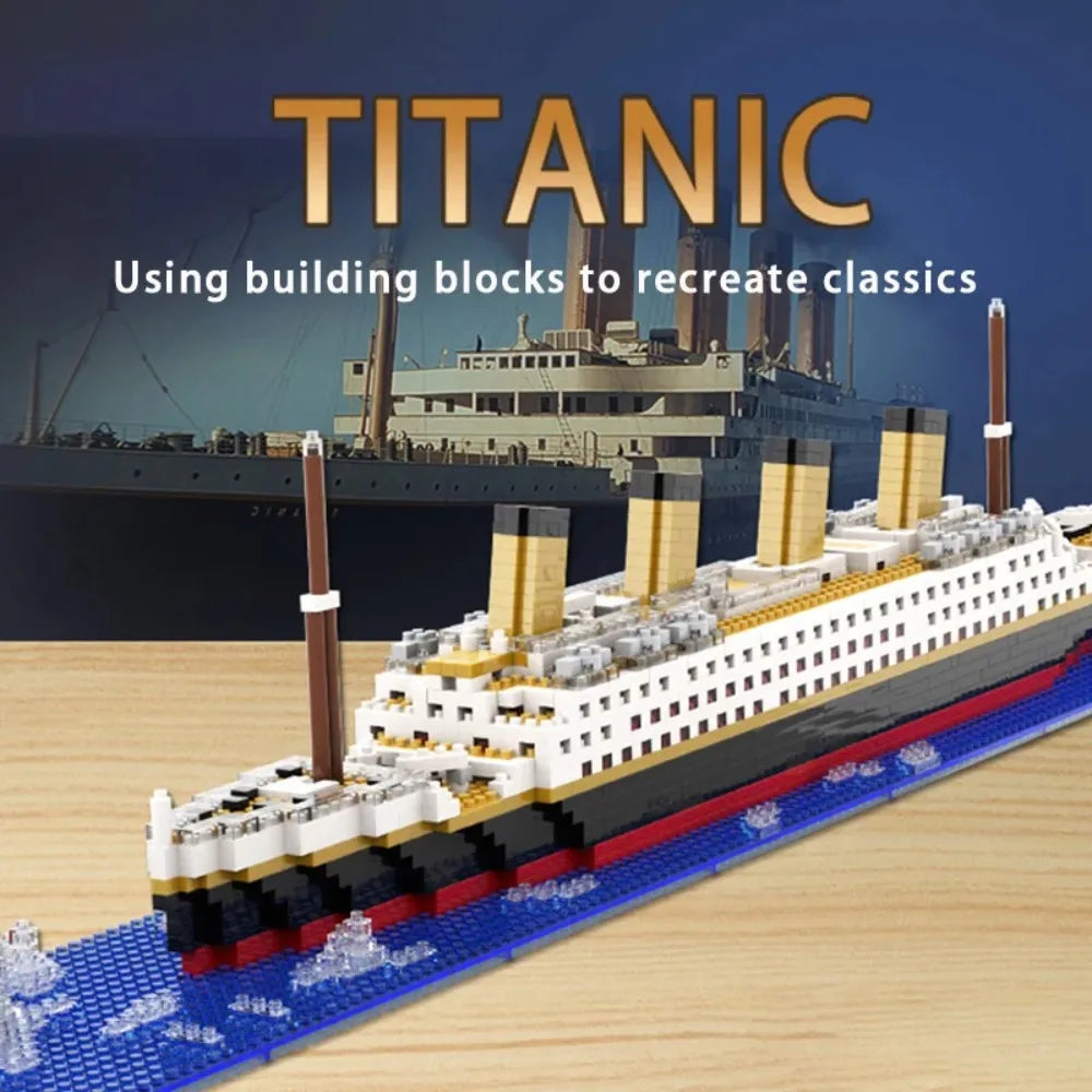 A detailed model kit of the Titanic ship built from building blocks on a wooden surface.