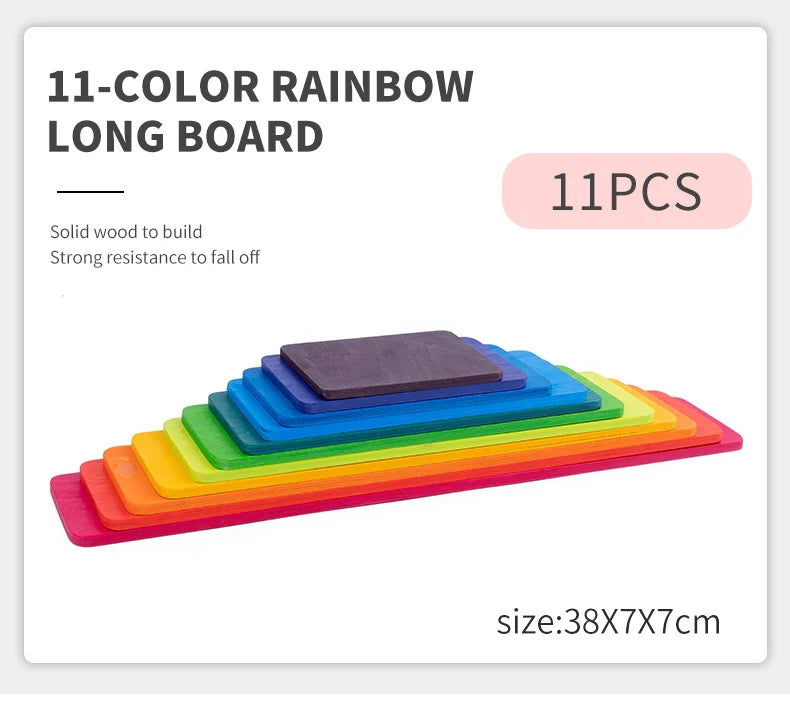 A long board of eleven colored rainbow wooden blocks stacked in a gradient formation.