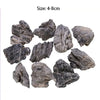 A collection of natural grey aquarium stones ranging in size from 4 to 8 centimeters.