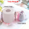 A white silicone tulip mold is shown next to a pink flower, demonstrating its size for candle and soap making.