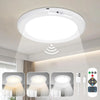 A white LED motion sensor ceiling light fixture is shown mounted on a ceiling, with close-up views of the light and its compo