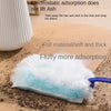 A fluffy blue electrostatic dusting pad is shown next to a white container, demonstrating its ability to pick up dust and deb