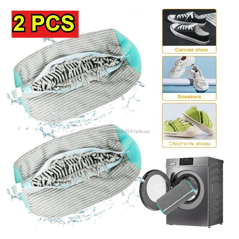 Two grey canvas shoe laundry bags with protective mesh nets shown next to a washing machine.