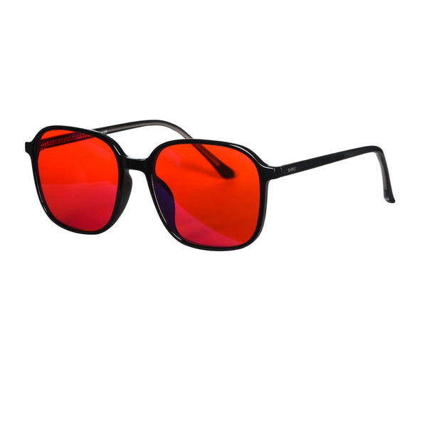 A pair of square blue light blocking sunglasses with vibrant orange and red lenses.