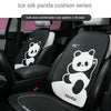 Black car seat covers featuring cute panda patterns and headrest pillows for a soft and comfortable fit.