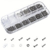 A clear plastic case containing various precision tools and replacement parts for glasses repair.