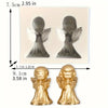 A set of two silicone molds depicting an angel figure, shown alongside a golden-colored finished product.
