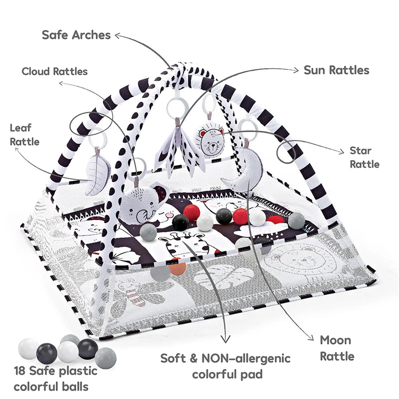 A baby play gym featuring safe arches and various rattles including cloud, sun, star, and moon rattles on a colorful pad.