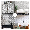 A collection of interior designs featuring boho leaf peel-and-stick wallpaper in green and white on furniture and walls.
