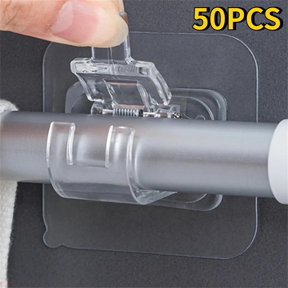 A hand is installing clear self-adhesive curtain rod hooks onto a gray metal rod, with a sheet of adhesive backing visible.