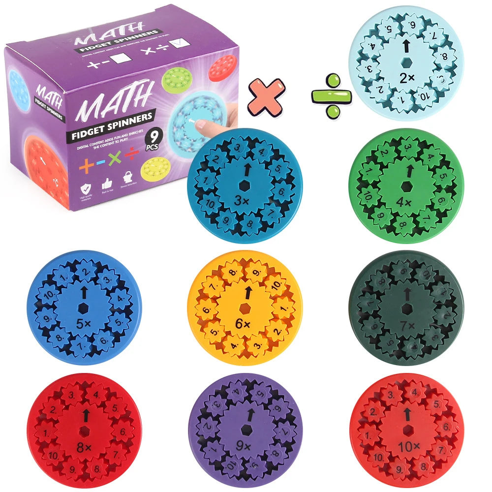 A set of nine colorful math fidget spinners showing multiplication and division problems on circular discs.