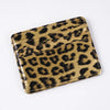 A brown leopard print PU leather card wallet shown from above.