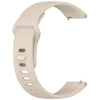 A beige silicone watch band and protective case for a smartwatch, shown from the side.