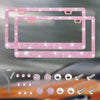 A crystal rhinestone license plate frame with screw caps and various mounting screws shown in a close-up view.