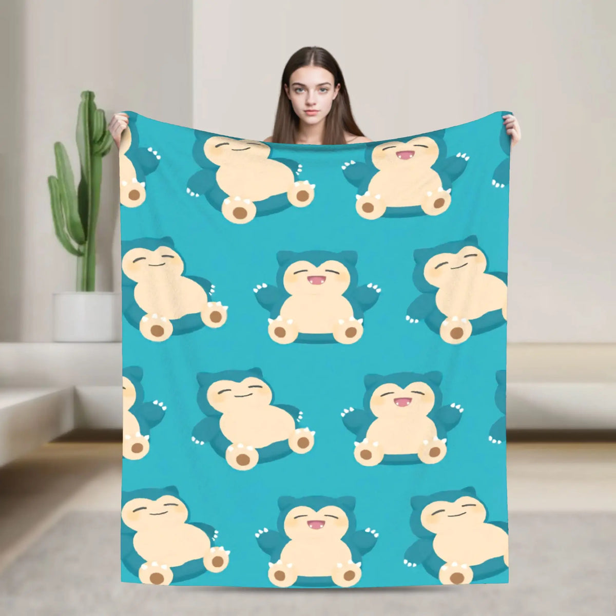 A teal blanket featuring a repeating pattern of cute, smiling Snorlax characters.