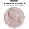 A close-up view of a pink silicone mat with several rounded pads, demonstrating waterproof protection.