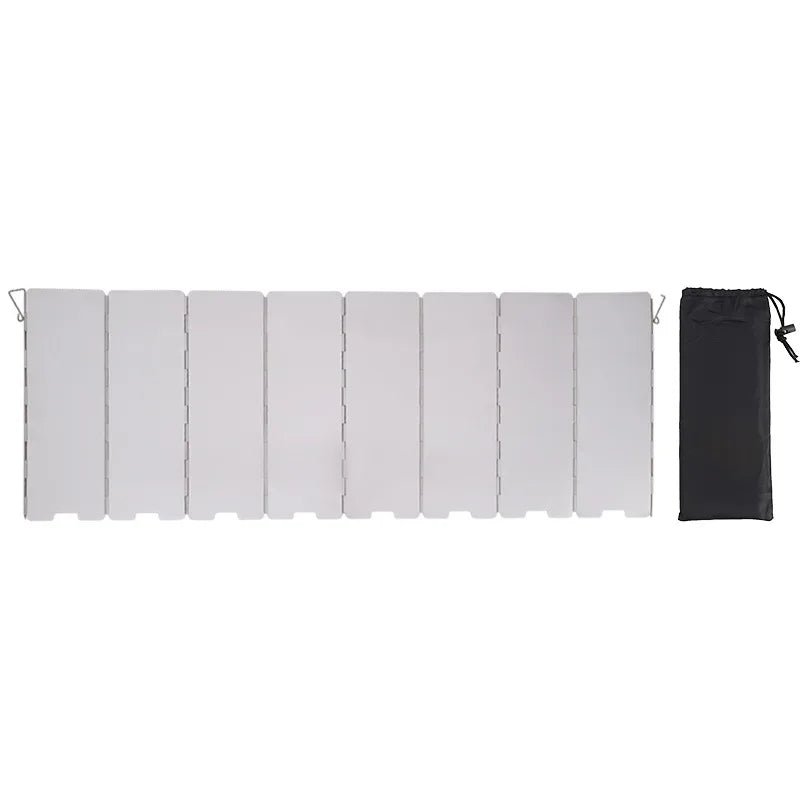 A set of twelve white portable aluminum alloy windshield panels and a black storage bag for camping stoves.