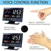 Demonstration of voice control function for a digital weather station clock with temperature and humidity display.