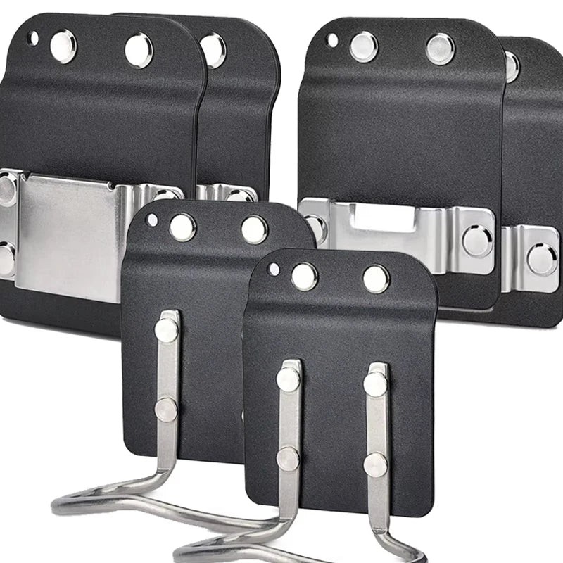 A set of black clip-on tool belt holsters with silver hardware for securing drills and power tools.