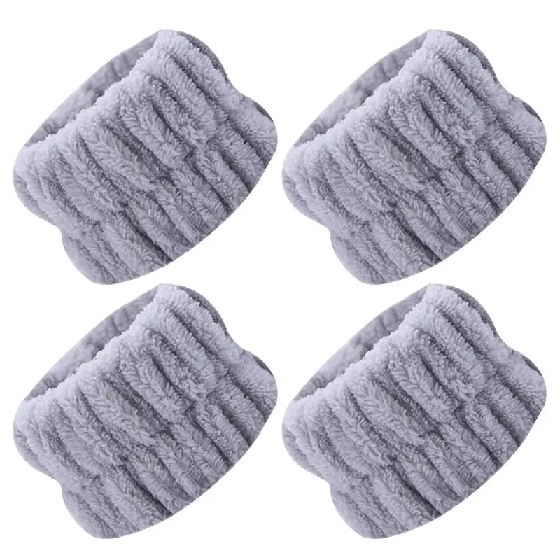 Gray absorbent microfiber wrist washing bands or face-saving cuffs shown from above.