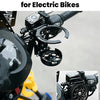 A black water bottle holder is installed on a bicycle handlebar for easy hydration.