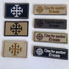 A collection of five embroidered tactical patches featuring the Knights Templar cross design and text related to a Crusade.
