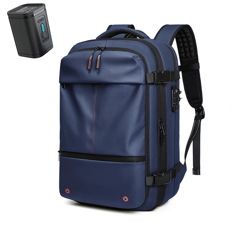 A navy blue expandable travel laptop backpack with black accents and a separate vacuum compression device.