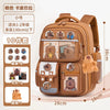 A tan backpack featuring various capybara-themed patches and compartments for children.
