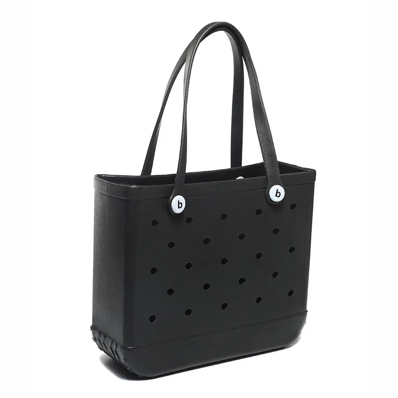 Schwarze tragbare EVA-Strandtasche mit zwei Henkeln und kleinem Logo-Detail.