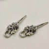 A set of five silver gothic skull and crow head charms for jewelry making