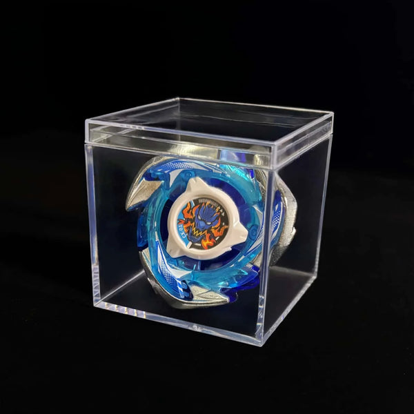A metal spinning top featuring blue and silver accents displayed inside a clear plastic box.