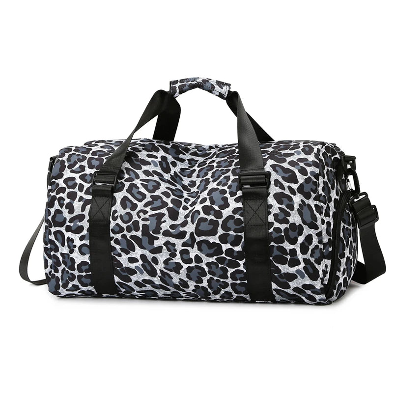 A black and white leopard print travel tote bag with shoulder straps.