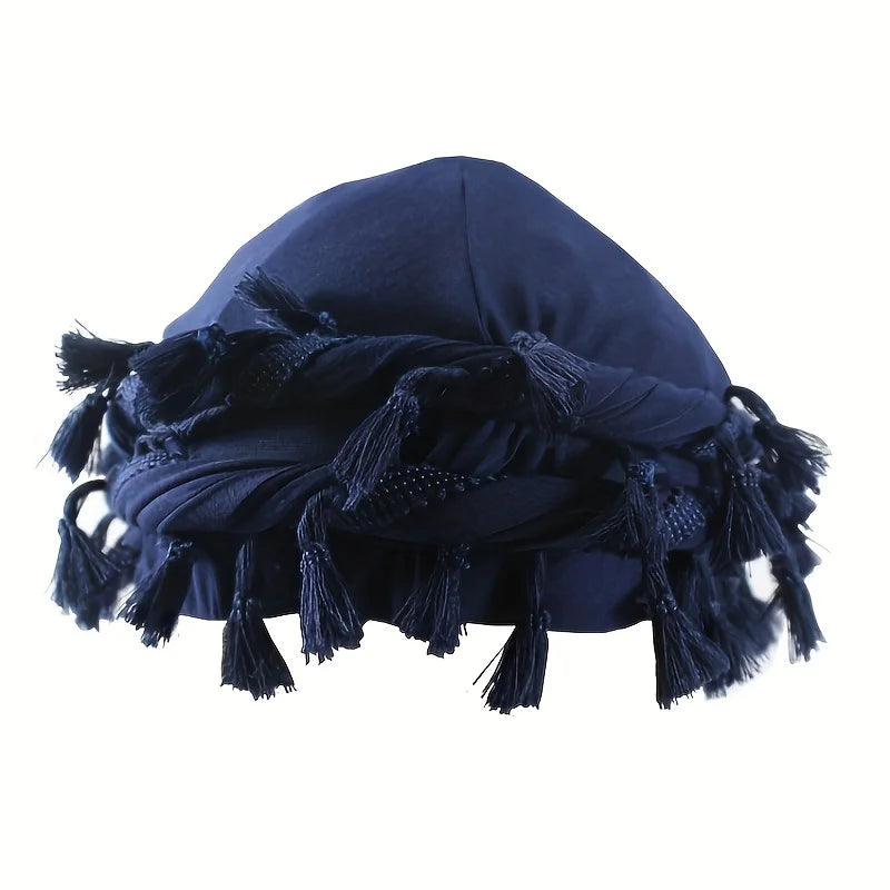 A dark navy blue vintage twist head wrap with black tassels.