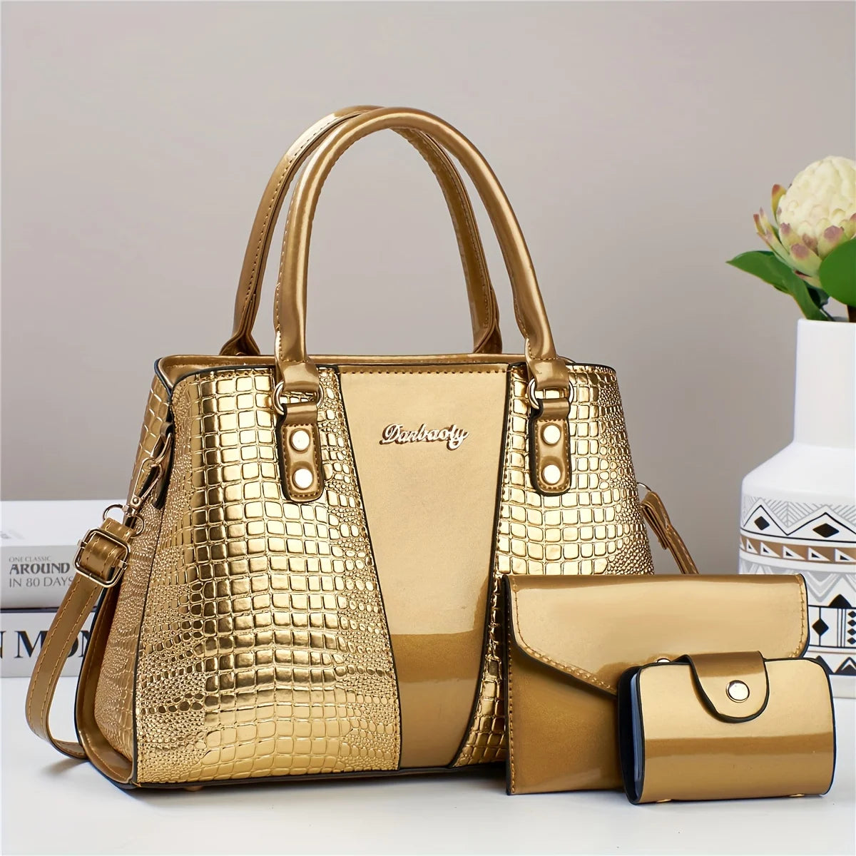 Goldener Krokodilmuster-Patentlederhandtaschen-Set mit großer Tasche und Clutch