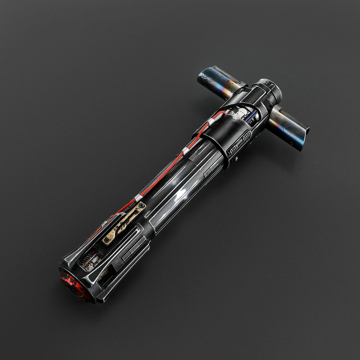 A black metal hilt lightsaber with motion control features and sound fonts displayed against a dark gray background.