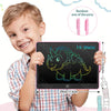 A smiling boy holds a pink 13-inch LCD writing tablet with a stylus pen, showing a dinosaur doodle on the screen.