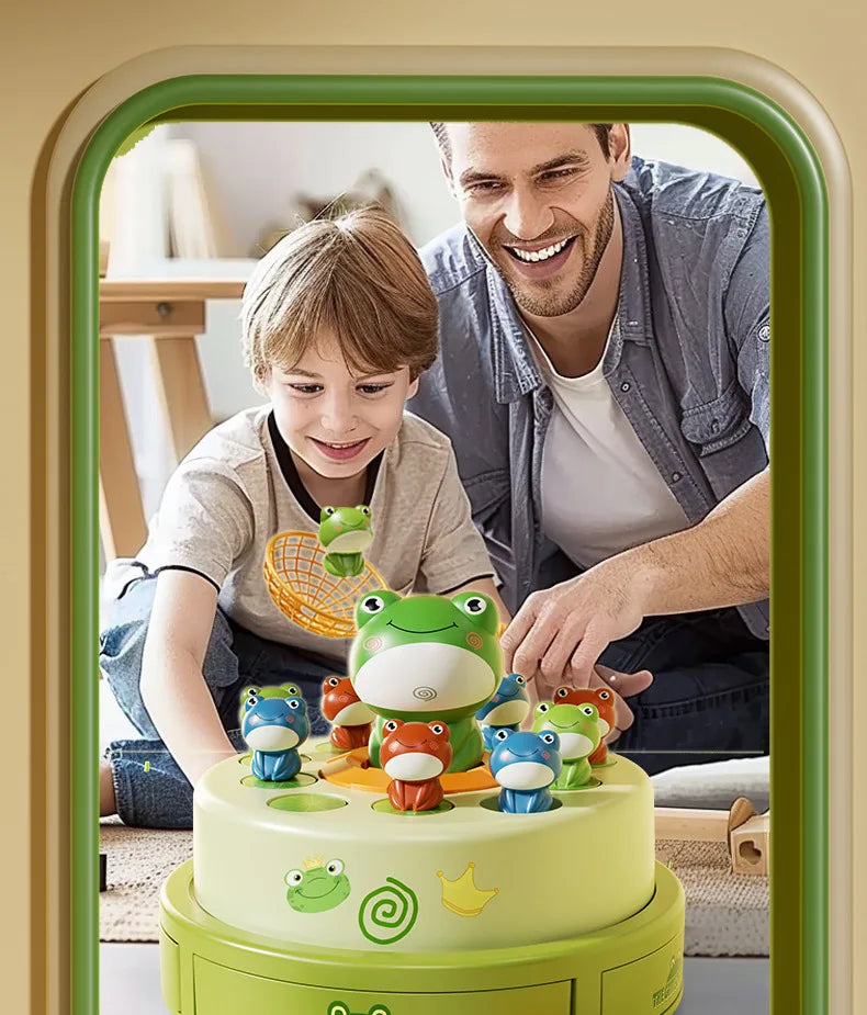 A man and a child are playing with a green jumping frog catch game on a cake.