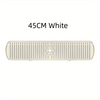 A rectangular white silicone faucet drain mat with vertical grooves and a central circular opening.