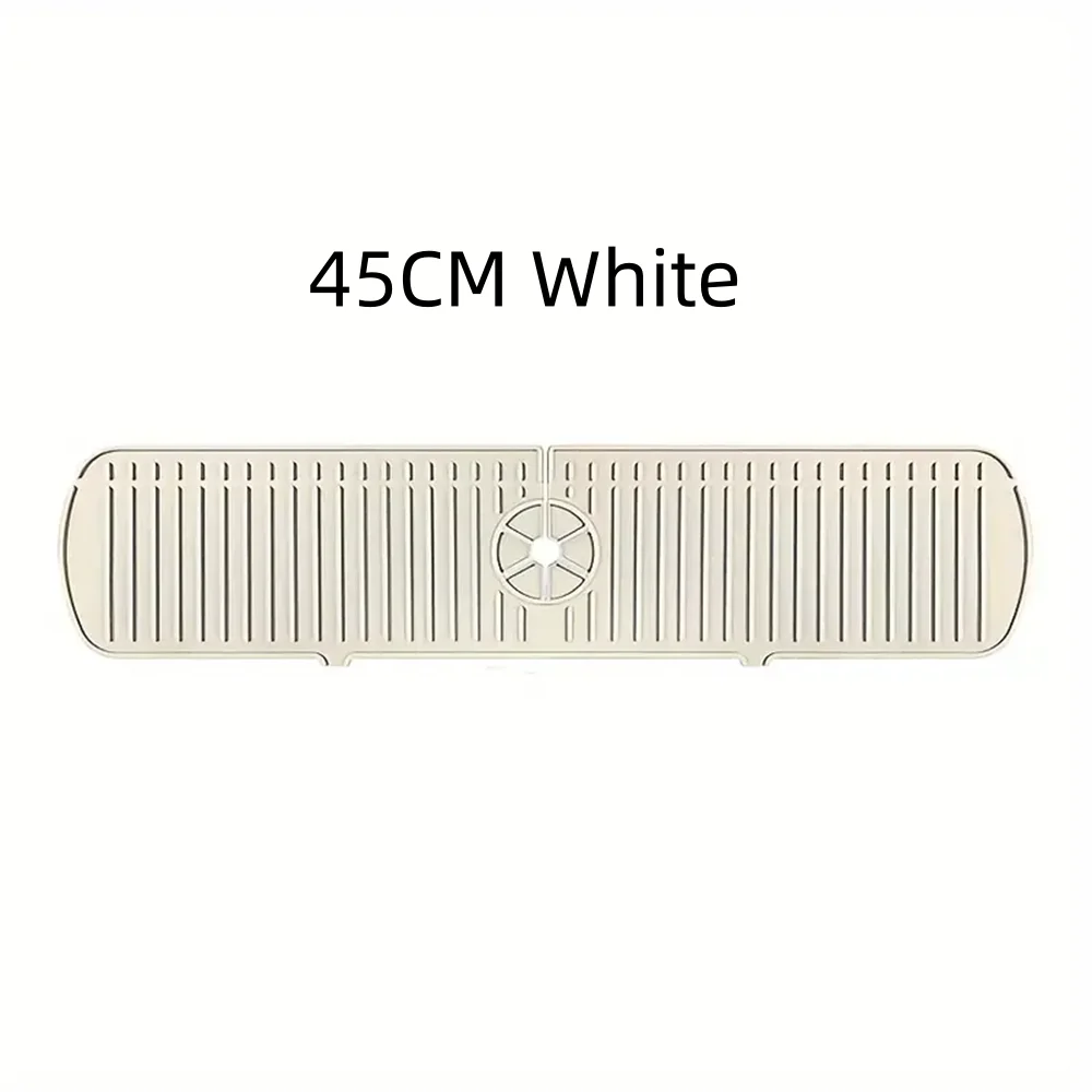 A rectangular white silicone faucet drain mat with vertical grooves and a central circular opening.