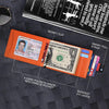 An orange slim wallet with card slots and a money clip is shown on a dark textured surface.