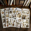 Sammlung von Vintage-Transferdruck-Sticker und buchthemeden Papierprodukten zum Scrapbooking